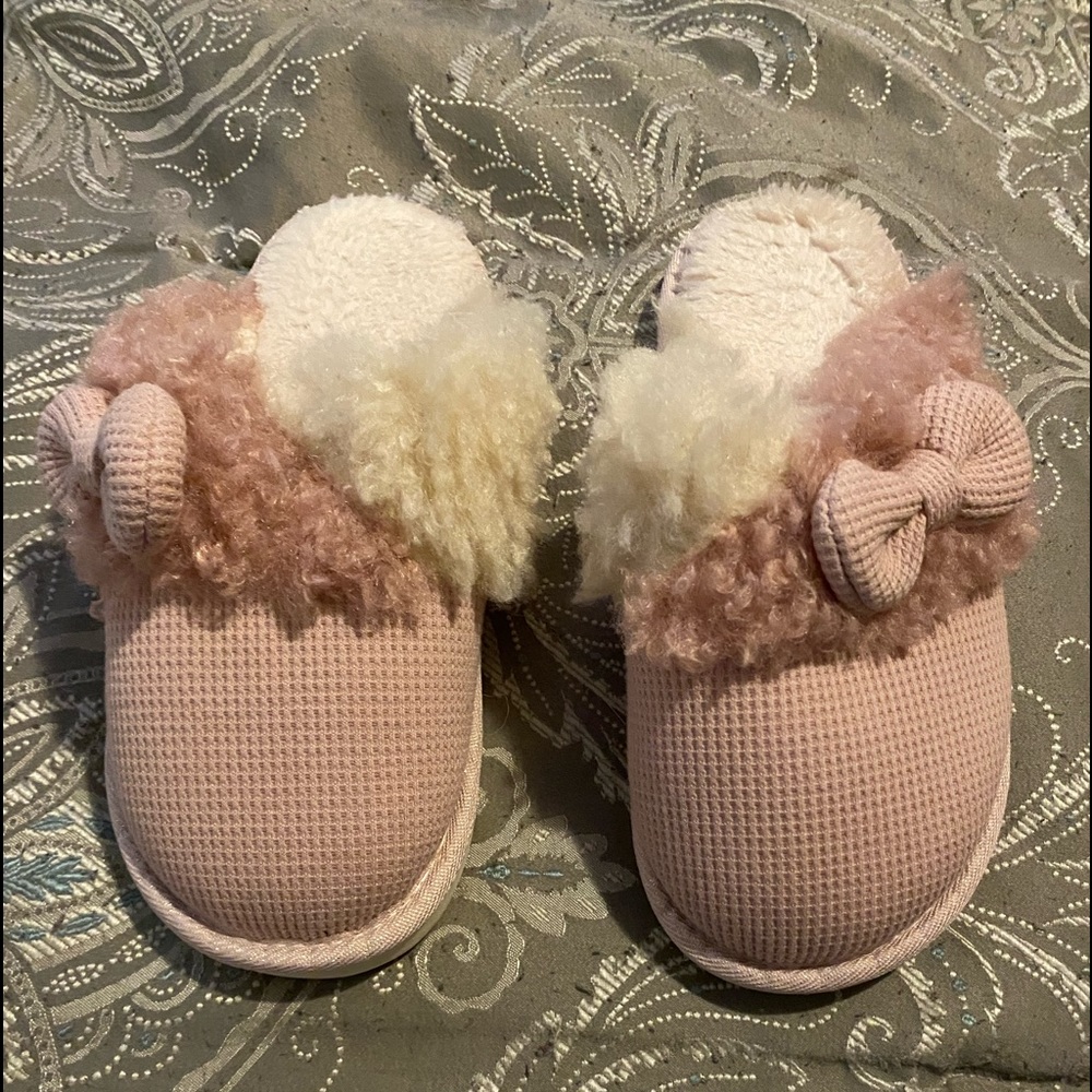 Pink and white slippers